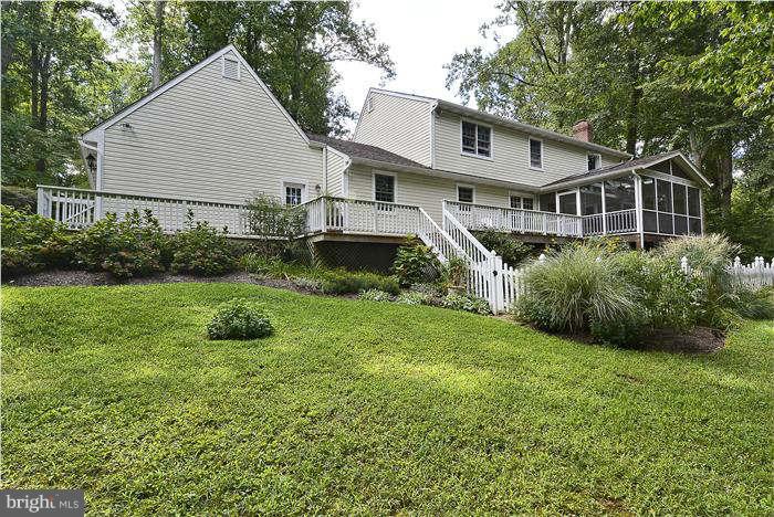 24 Elmridge Road Arnold, MD 21012 - Photo 23 of 30 a front view of a house with a yard and garage