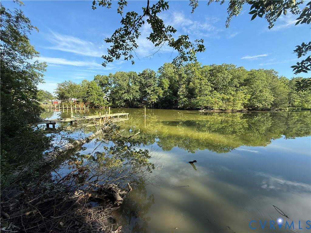 88 Seahawk Road Urbanna, VA 23175 - Photo 6 of 16 Waterfront property featuring a wooden dock, calm