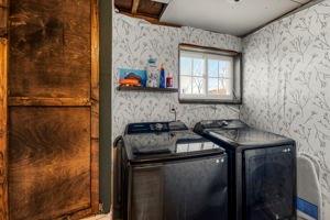 3544 Heathville-Ohl Road Summerville, PA 15864 - Photo 9 of 16 a utility room with stainless steel appliances kitchen island a stove a sink and a window