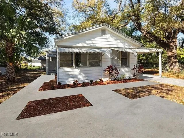 a front view of a house with porch