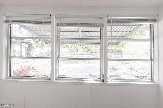 a view of a room that has a window