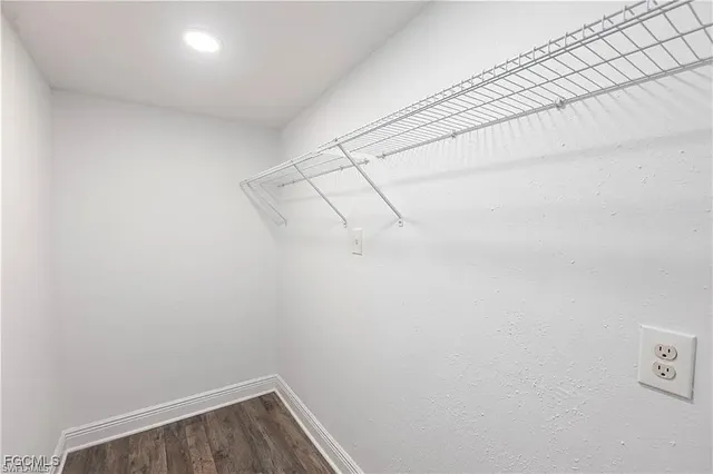 a view of a room with racks on the wall