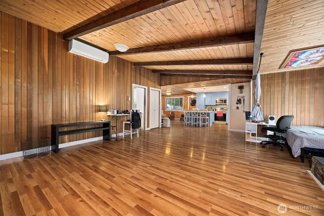 a lobby with furniture and floor to ceiling window