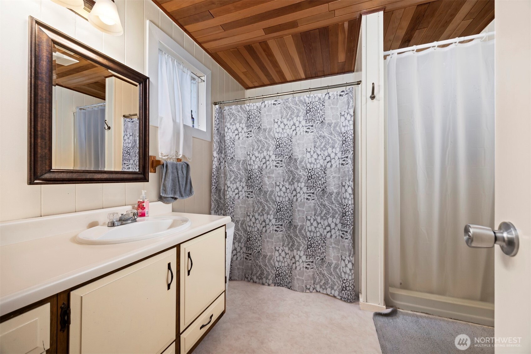 3630 Sorenson Road Everson, WA 98247 - Photo 17 of 39 a bathroom with a sink and a mirror