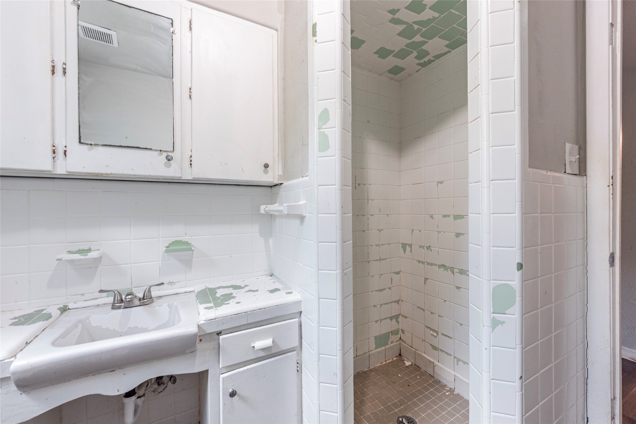 2801 Virginia Street, Unit B Baytown, TX 77520 - Photo 15 of 20 a bathroom with a sink and a vanity