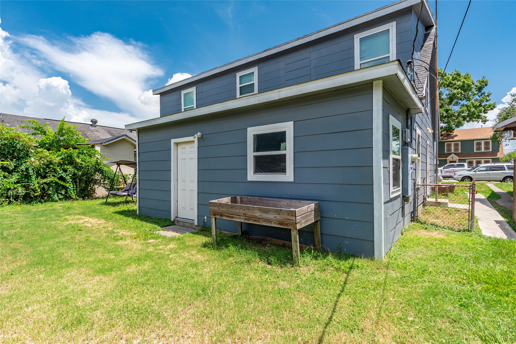 2801 Virginia Street, Unit B Baytown, TX 77520 - Photo 18 of 20 a backyard of a house with seating space