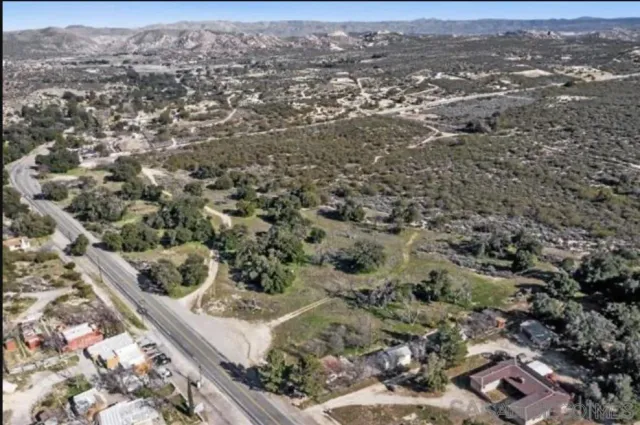 an aerial view of residential house with parking space