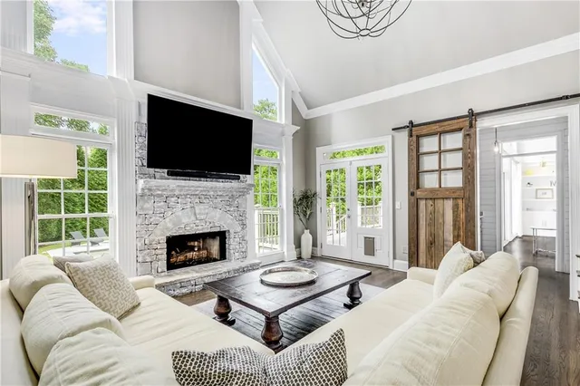 a living room with furniture and a table