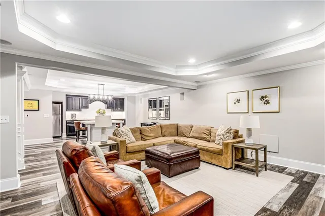 a view of a livingroom with workspace and a couch