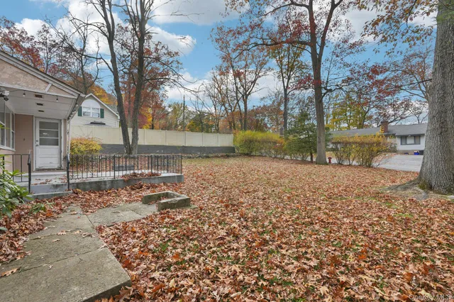 a view of a yard with a slide