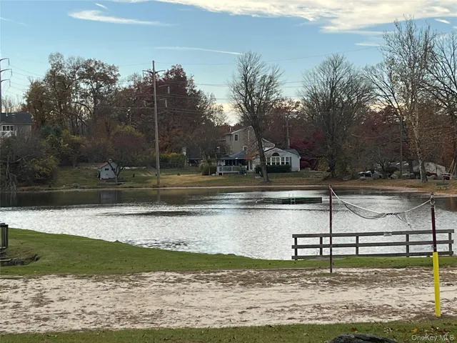 a view of a park with swings and slides