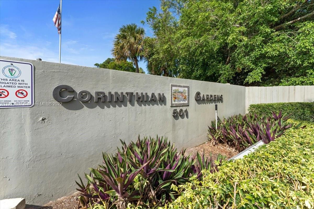 501 Southwest 11th Place, Unit 110 Boca Raton, FL 33432 - Photo 1 of 42 a view of a sign in a park