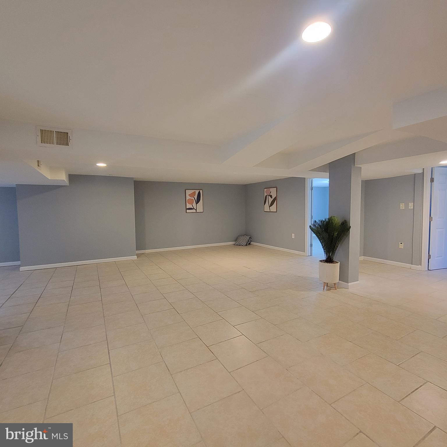 401 Rosier Road Fort Washington, MD 20744 - Photo 27 of 40 Lower level view- ceramic tile flooring th/out!