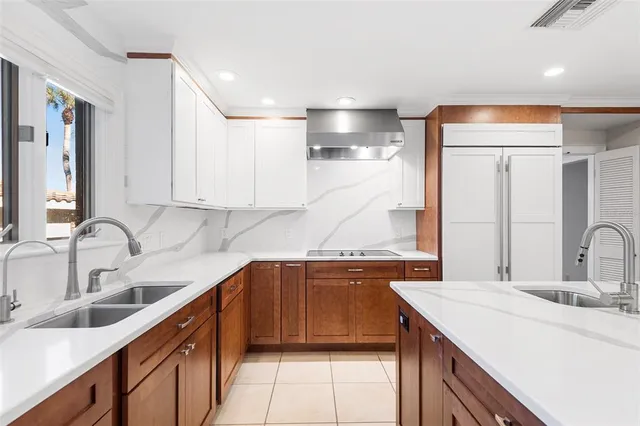 a view of a room with wooden floor and window