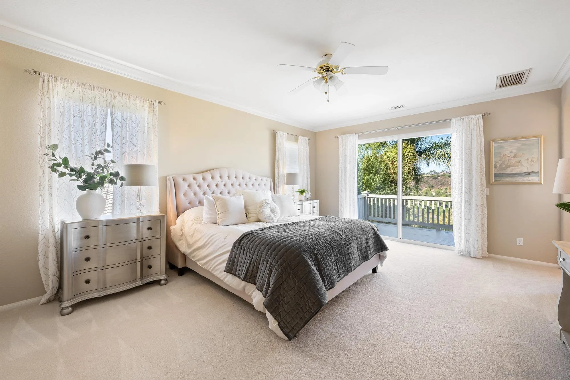2822 Rancho Pancho Carlsbad, CA 92009 - Photo 12 of 26 a spacious bedroom with a bed and window