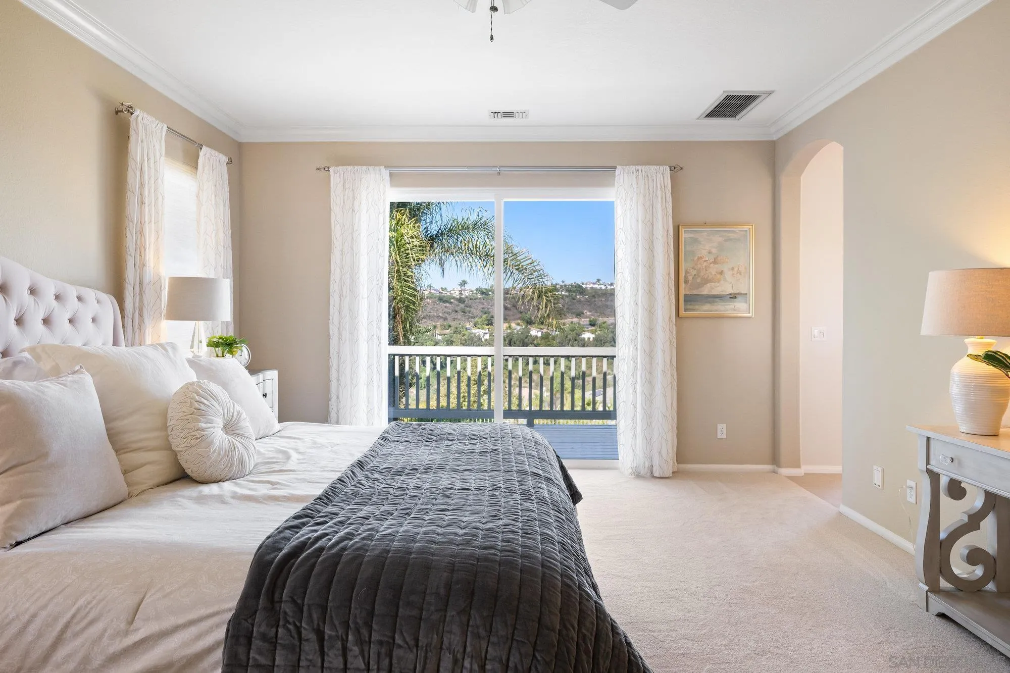 2822 Rancho Pancho Carlsbad, CA 92009 - Photo 13 of 26 a bedroom with a bed and a window