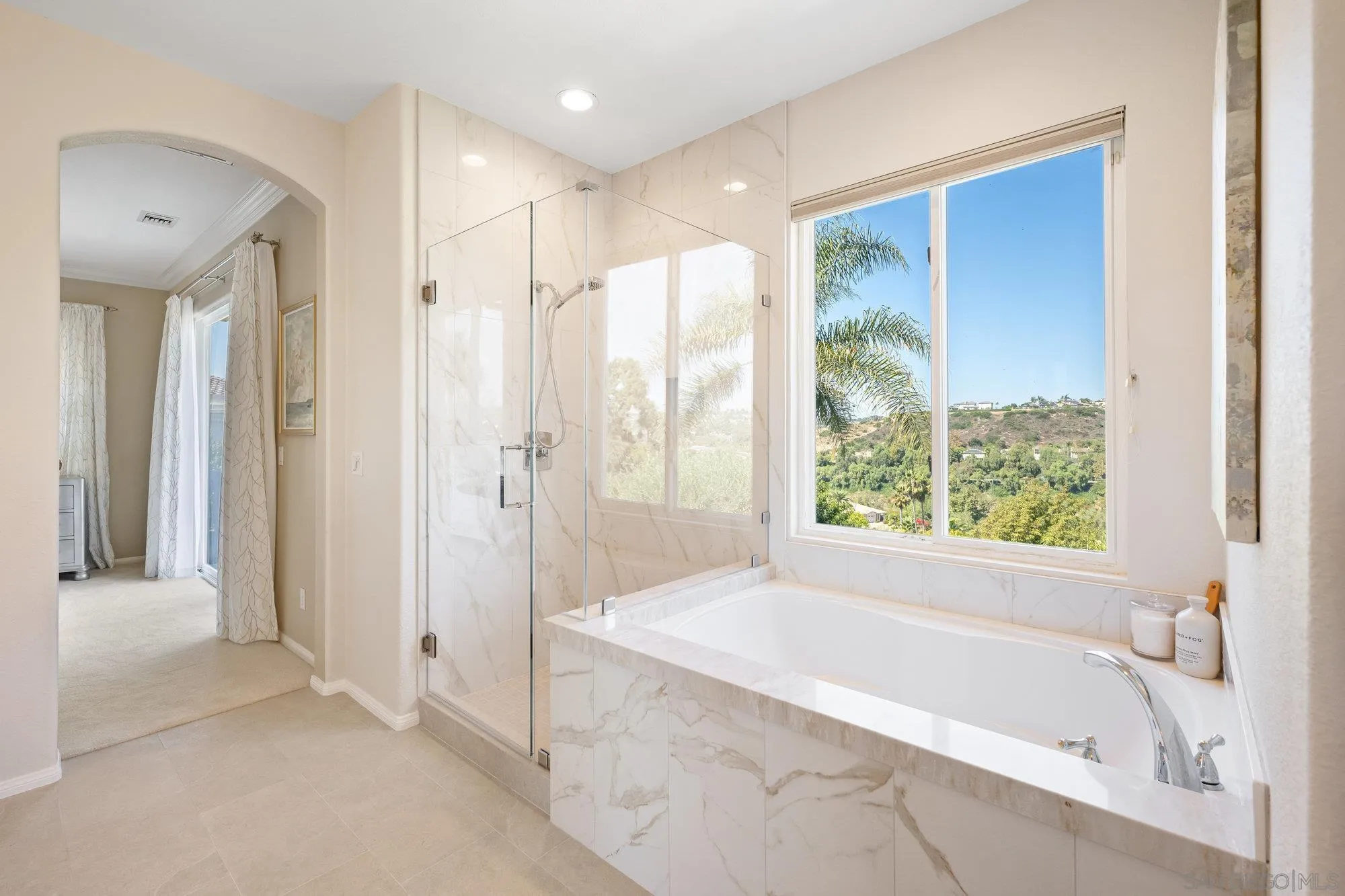 2822 Rancho Pancho Carlsbad, CA 92009 - Photo 14 of 26 a bathroom with a bathtub and a shower