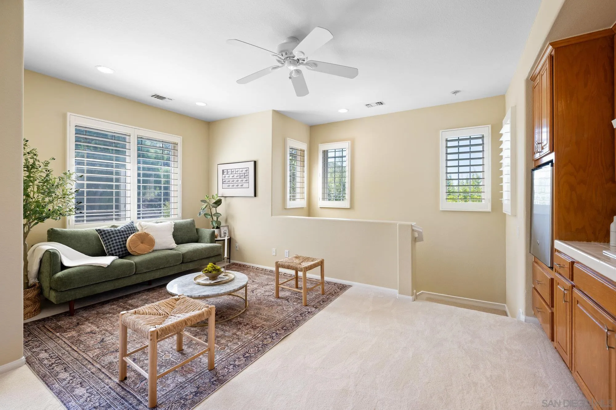 2822 Rancho Pancho Carlsbad, CA 92009 - Photo 16 of 26 a living room with furniture and a window