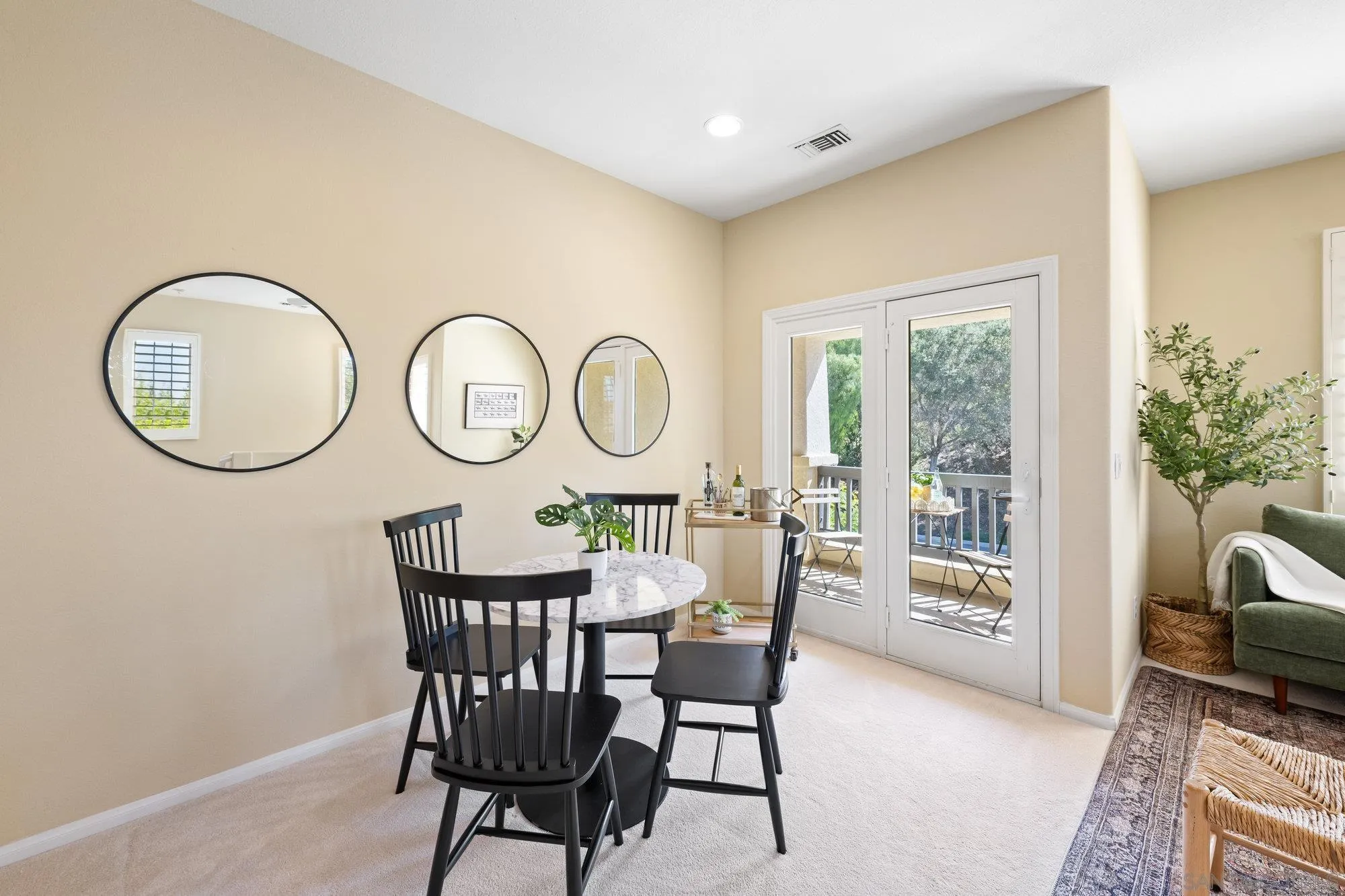 2822 Rancho Pancho Carlsbad, CA 92009 - Photo 17 of 26 a view of a dining room with furniture and a large window