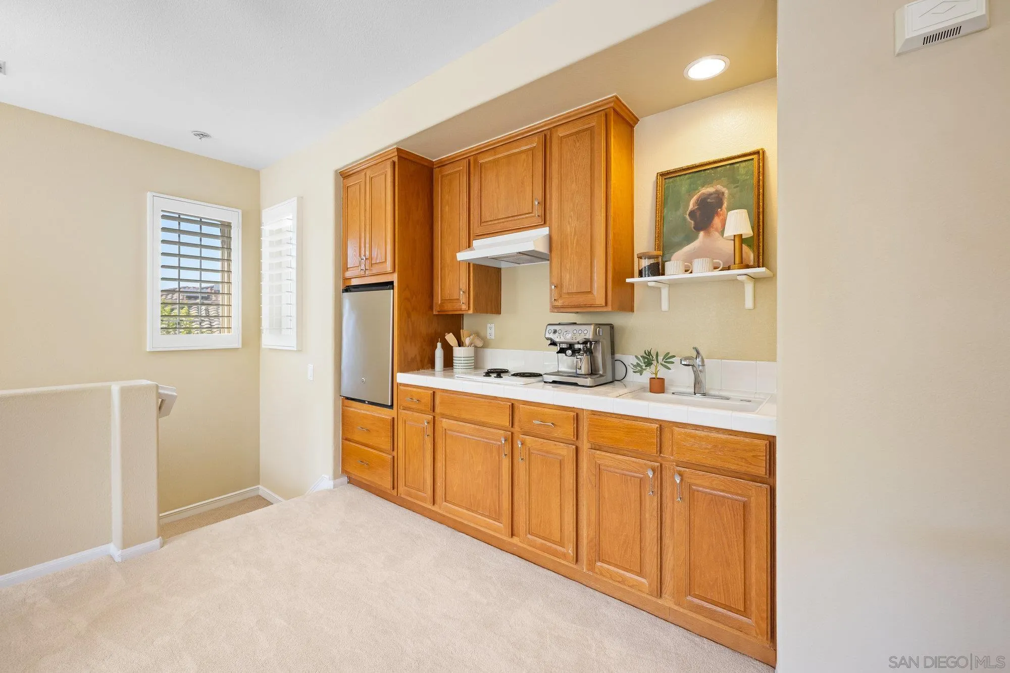 2822 Rancho Pancho Carlsbad, CA 92009 - Photo 18 of 26 a spacious bathroom with a double vanity sink a mirror and a bathtub