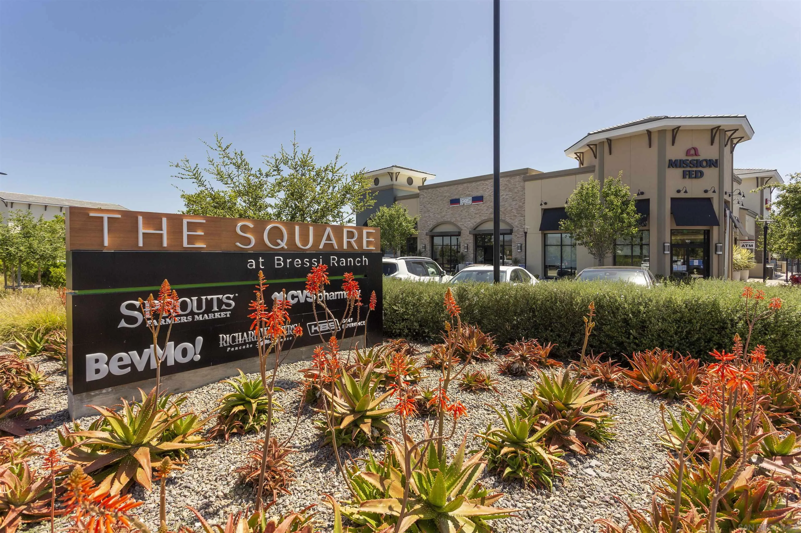 2822 Rancho Pancho Carlsbad, CA 92009 - Photo 24 of 26 a front view of a building with outdoor space