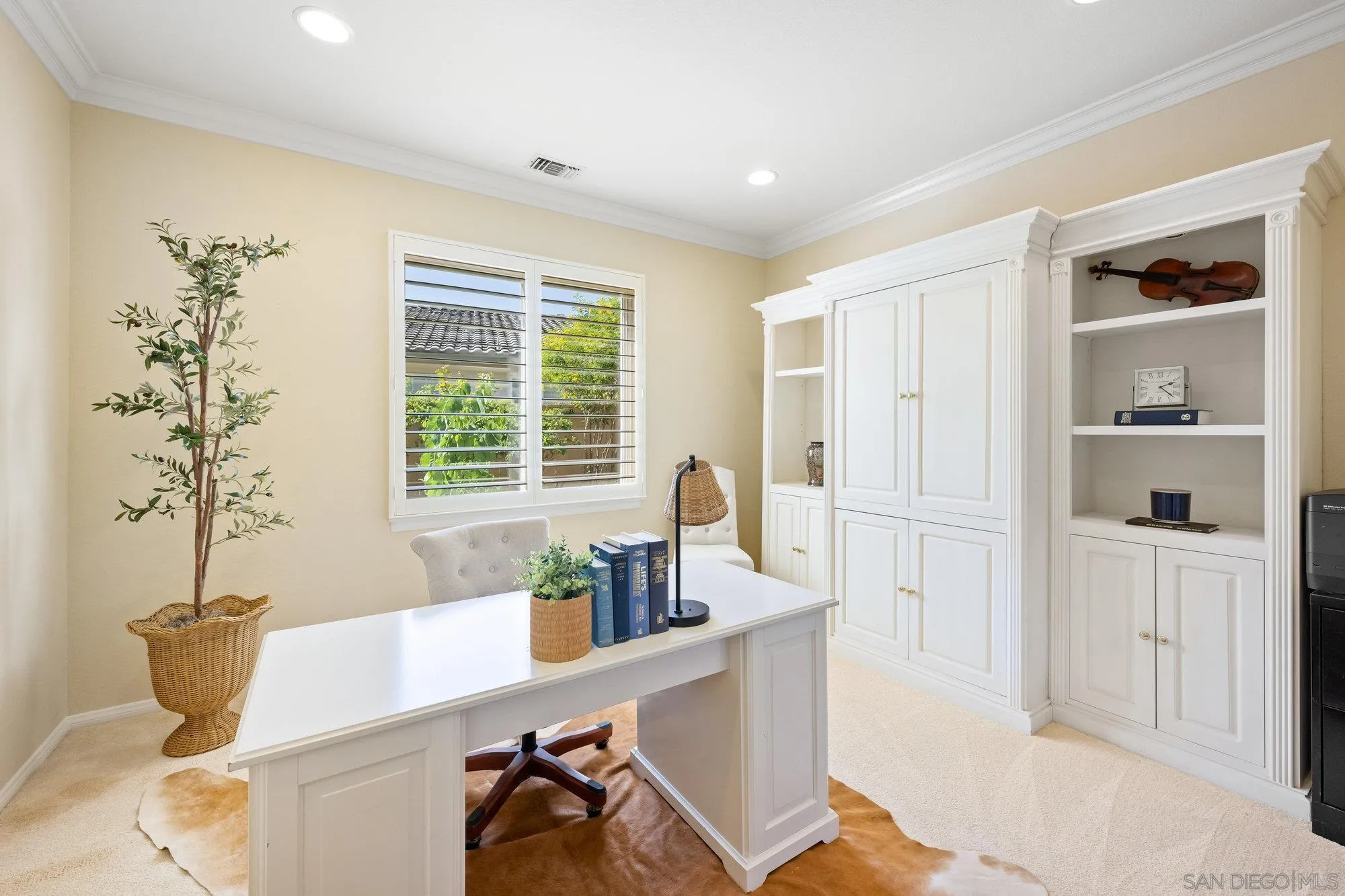 2822 Rancho Pancho Carlsbad, CA 92009 - Photo 6 of 26 a kitchen with a sink a counter and a window