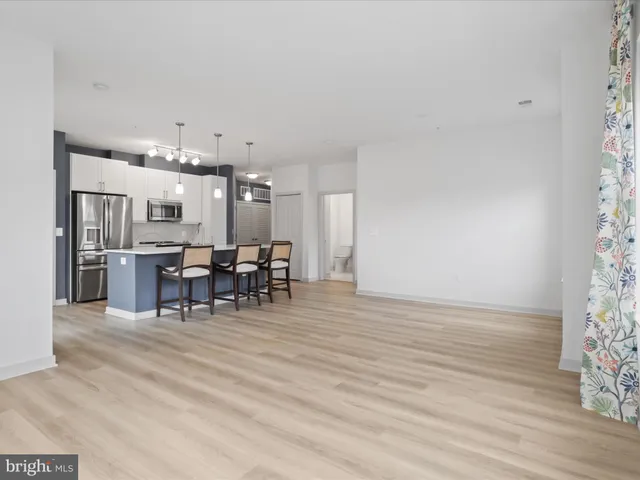 a bathroom with a shower and a toilet