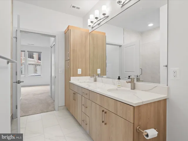 a view of a swimming pool and outdoor seating