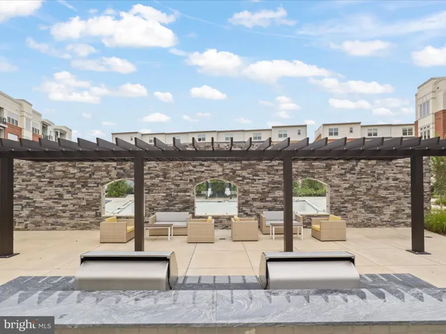 a view of a hallway with a living room