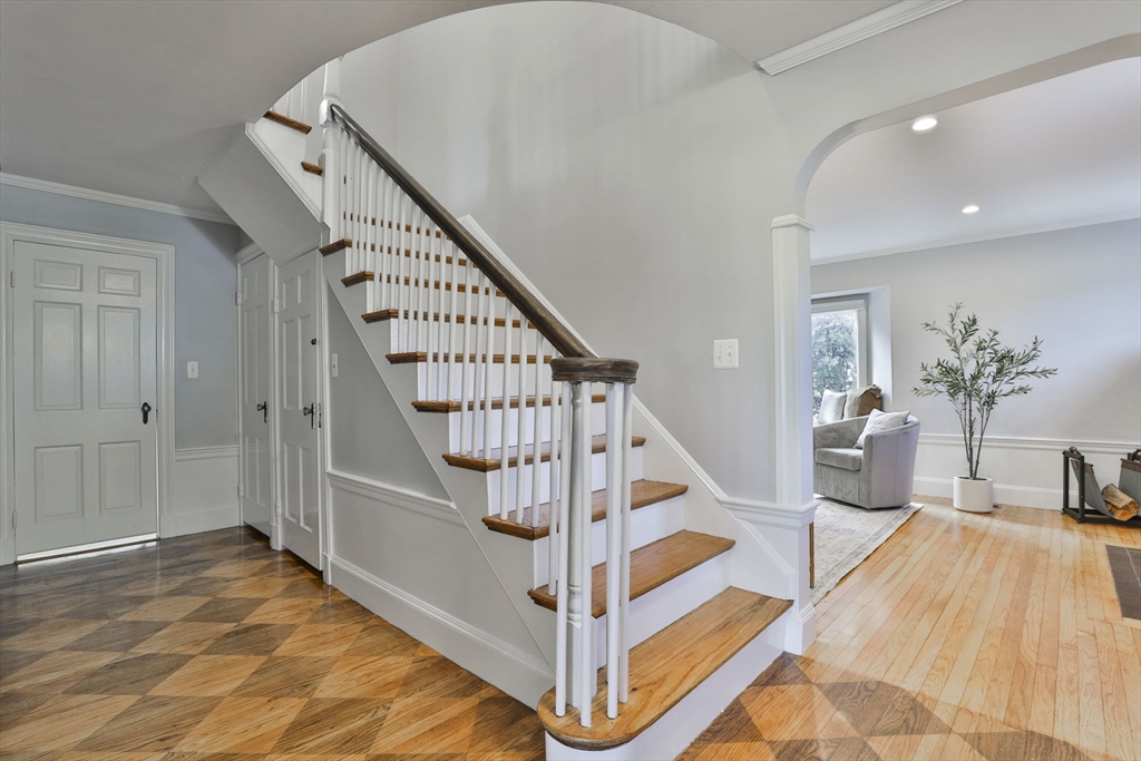10 Lawndale Road Milton, MA 02186 - Photo 2 of 42 a view of entryway bedroom and hall with wooden floor