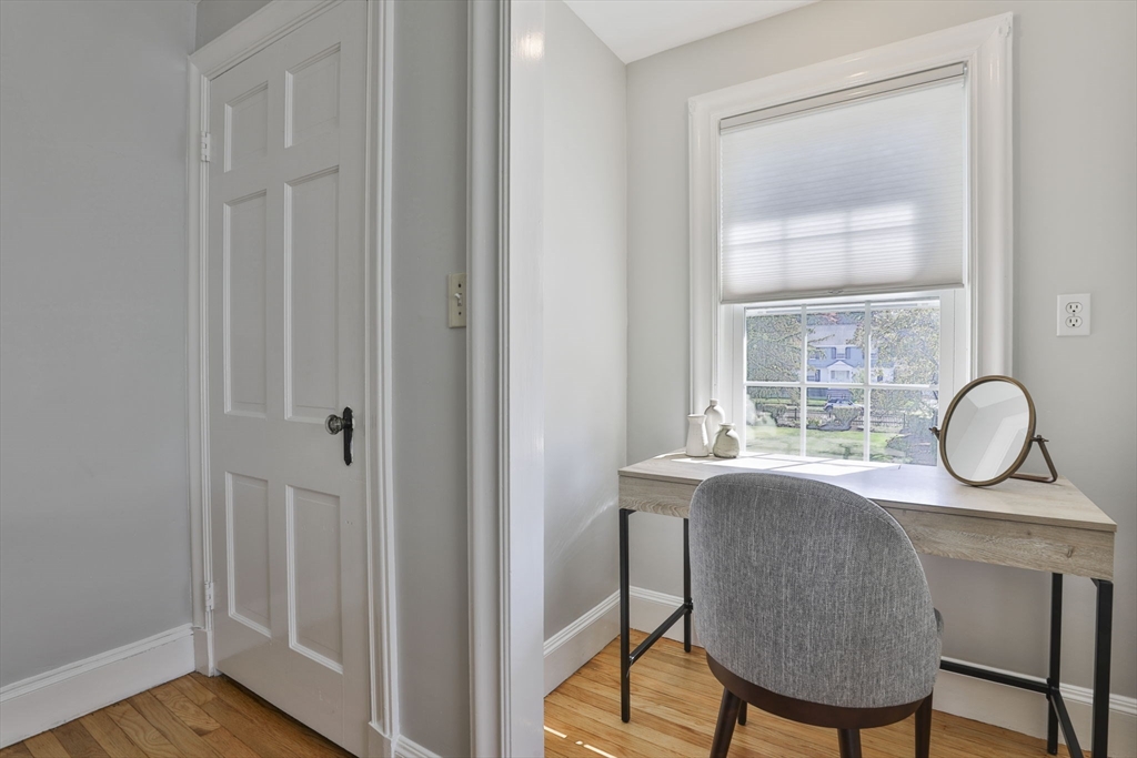 10 Lawndale Road Milton, MA 02186 - Photo 21 of 42 a dining room with furniture and wooden floor