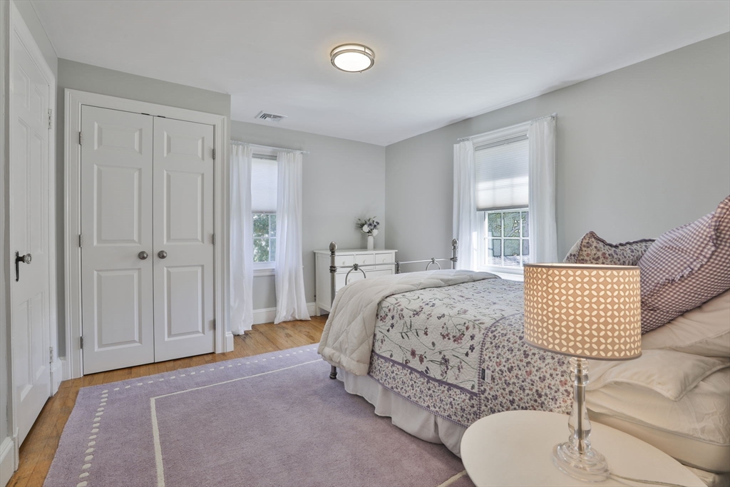 10 Lawndale Road Milton, MA 02186 - Photo 24 of 42 a bedroom with a bed and window