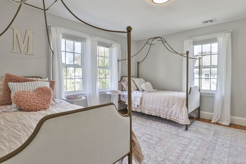 10 Lawndale Road Milton, MA 02186 - Photo 25 of 42 a bedroom with a bed and window