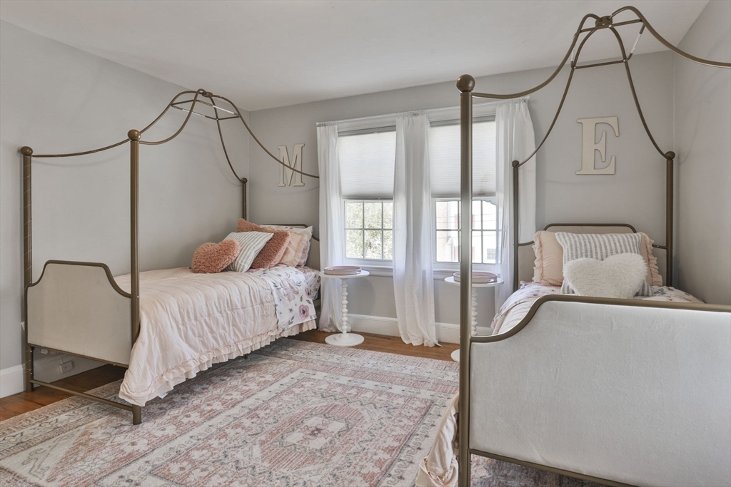 10 Lawndale Road Milton, MA 02186 - Photo 26 of 42 a bedroom with a bed window and a mirror