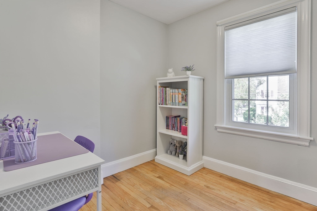 10 Lawndale Road Milton, MA 02186 - Photo 29 of 42 a bedroom with furniture and a window