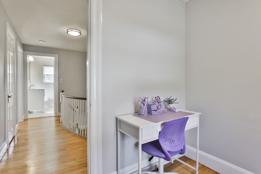 10 Lawndale Road Milton, MA 02186 - Photo 30 of 42 a view of a dining room with furniture and wooden floor