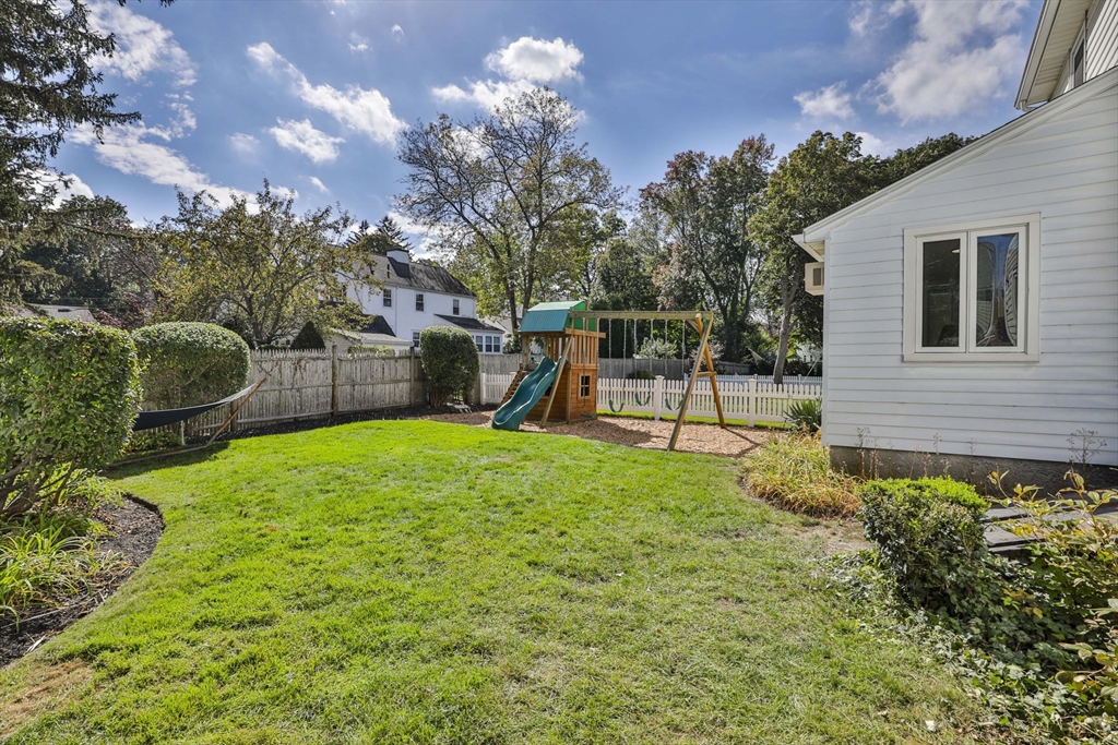 10 Lawndale Road Milton, MA 02186 - Photo 35 of 42 a view of a backyard with a garden and entertaining space