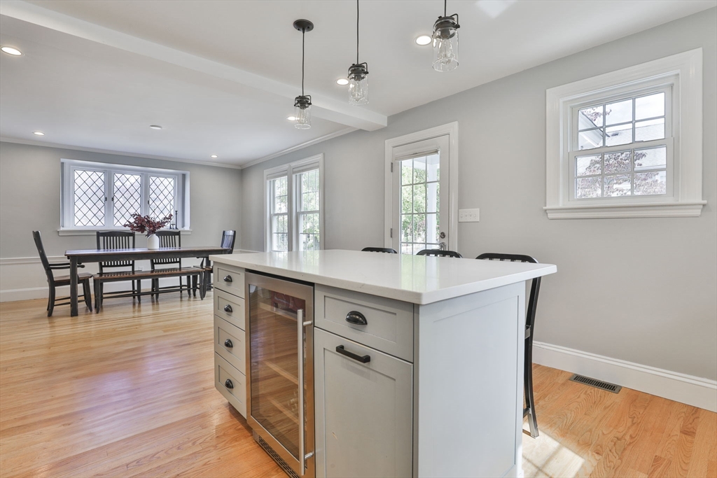 10 Lawndale Road Milton, MA 02186 - Photo 7 of 42 a kitchen with stainless steel appliances granite countertop a sink a stove and a refrigerator