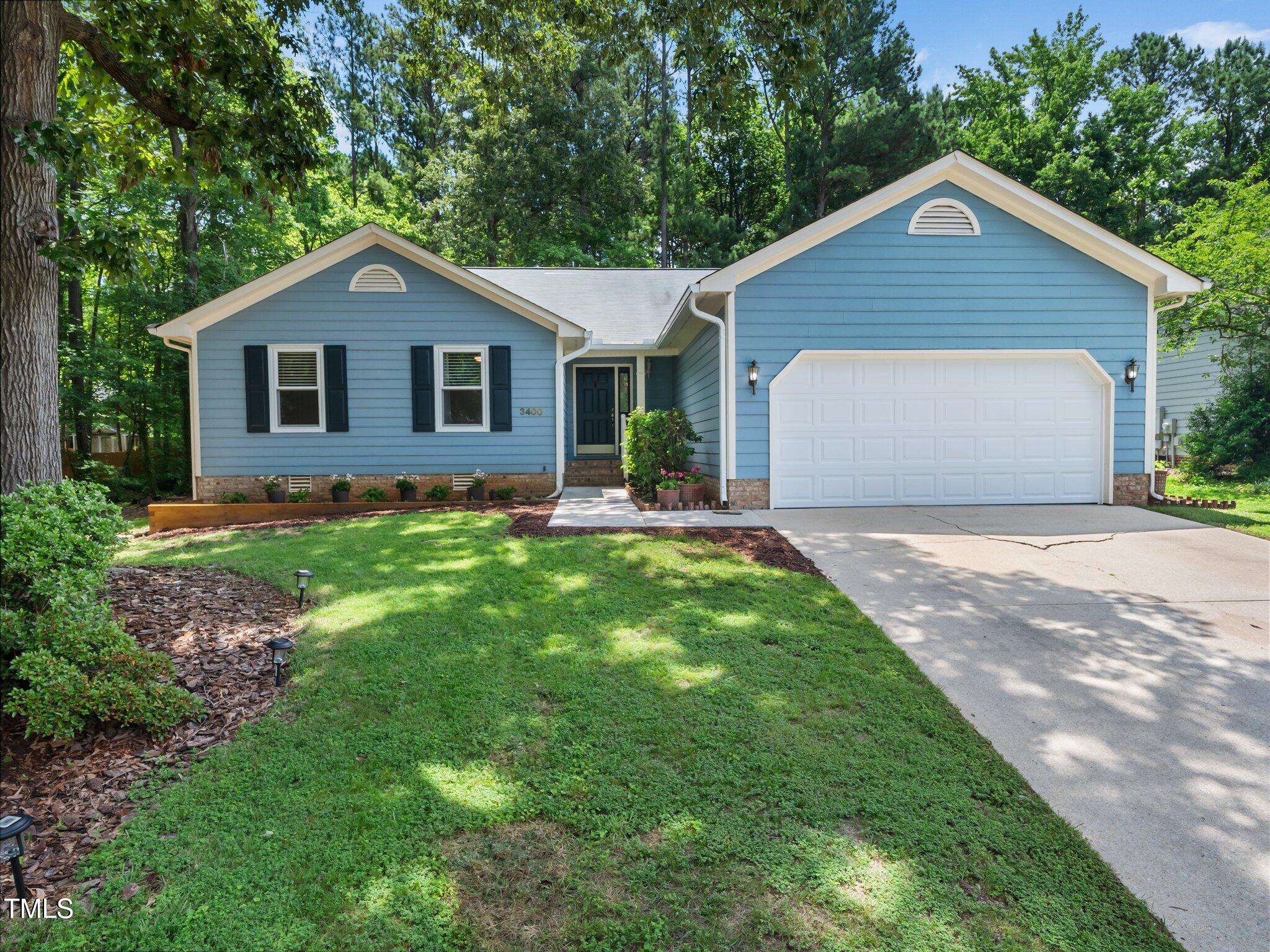 3400 Appling Way Durham, NC 27703 - Photo 1 of 30 a front view of house with yard and green space