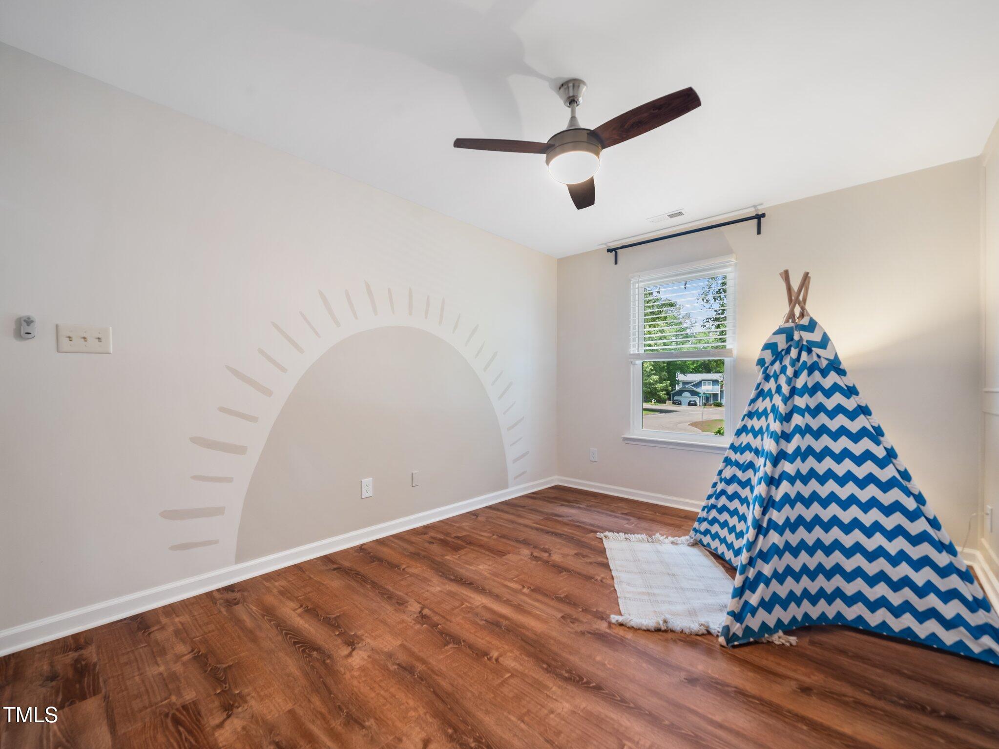 3400 Appling Way Durham, NC 27703 - Photo 20 of 30 a view of empty room with wooden floor