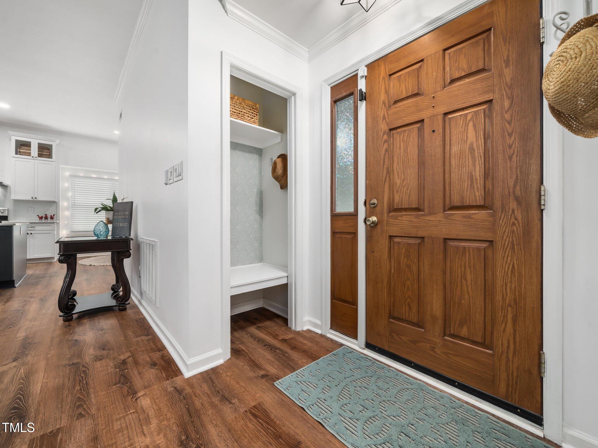 3400 Appling Way Durham, NC 27703 - Photo 2 of 30 a view of entryway with wooden floor