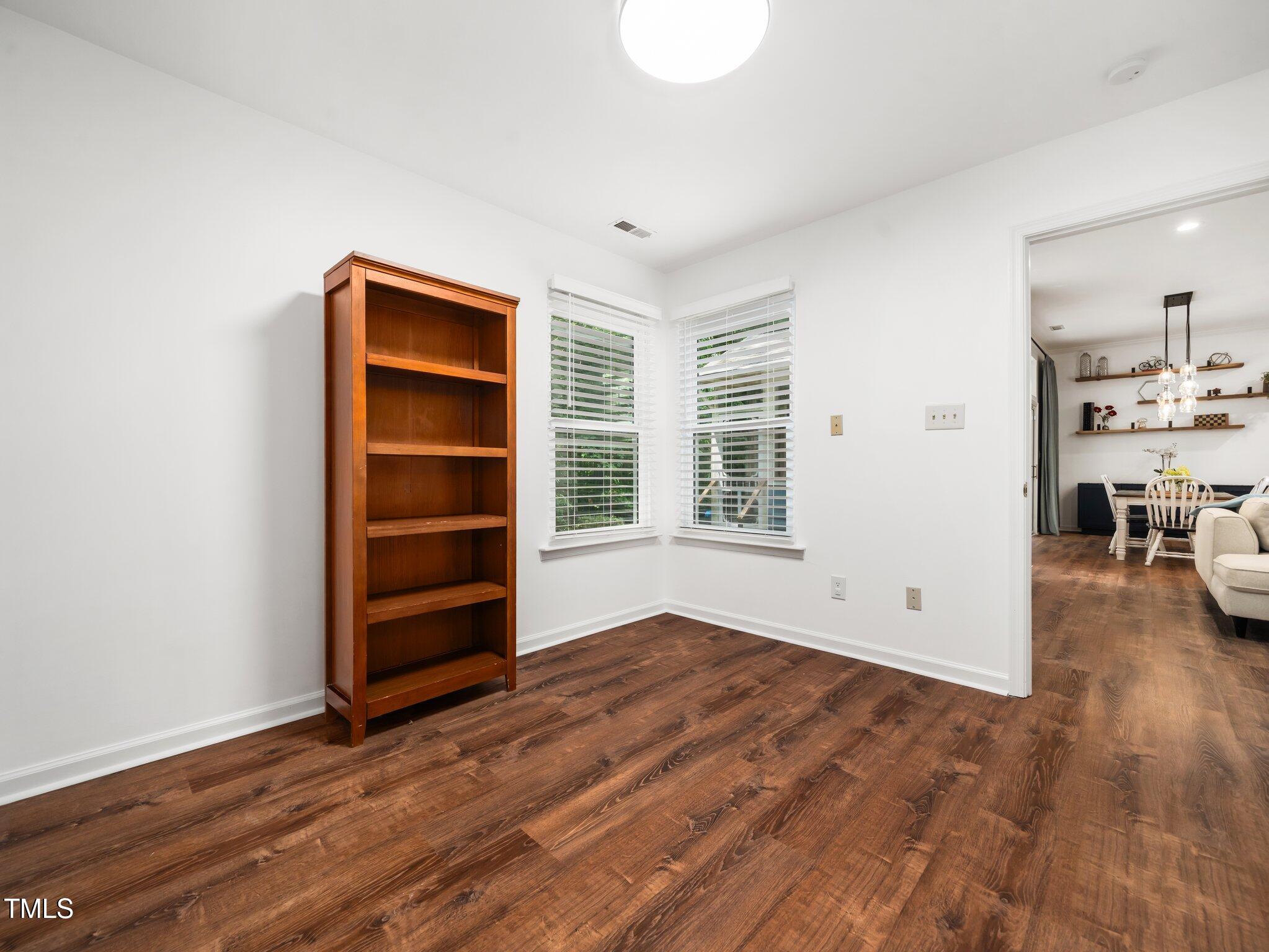 3400 Appling Way Durham, NC 27703 - Photo 23 of 30 a view of wooden floor and windows in a room