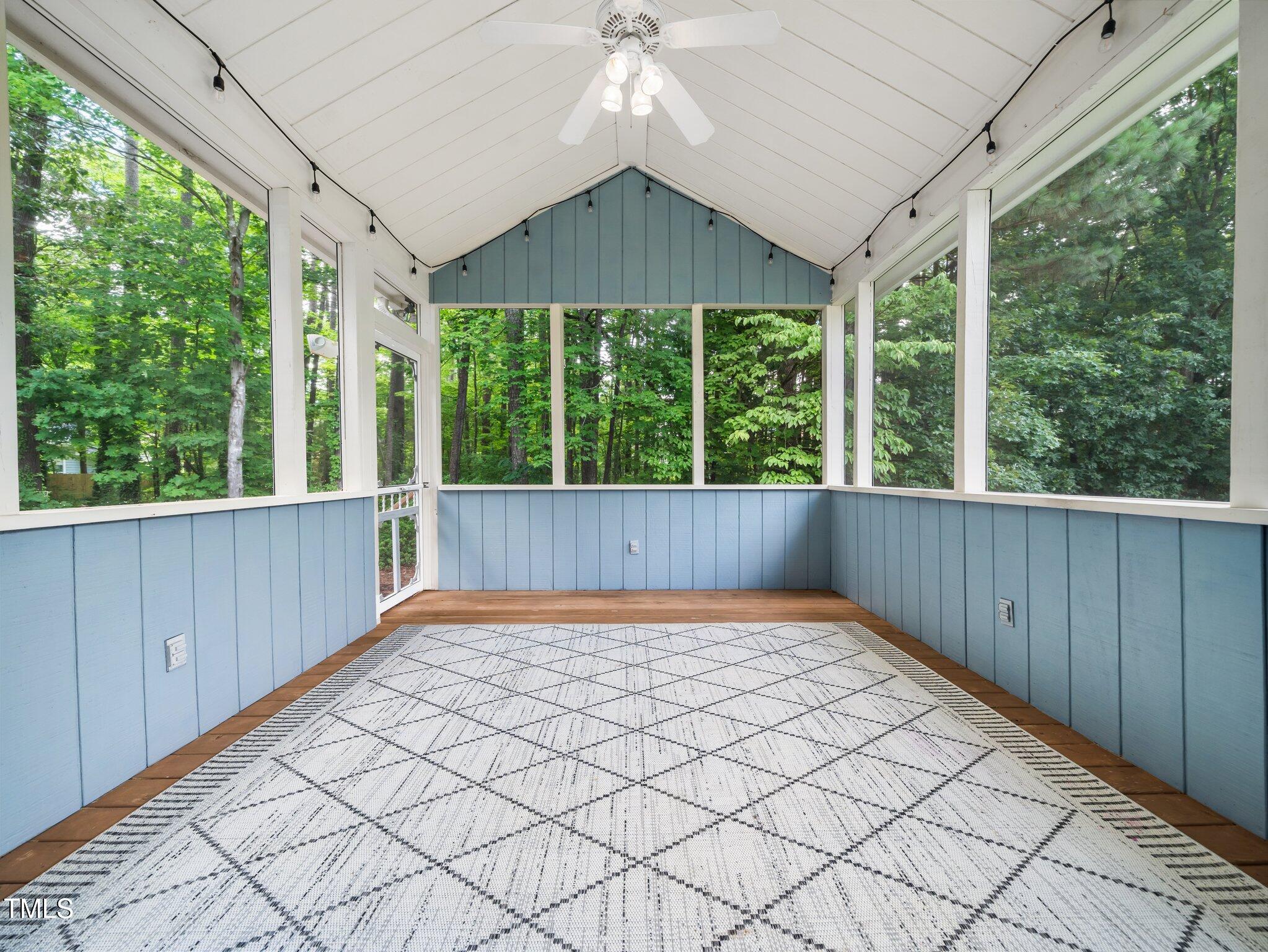 3400 Appling Way Durham, NC 27703 - Photo 24 of 30 a view of an empty room with a large window with wooden floor