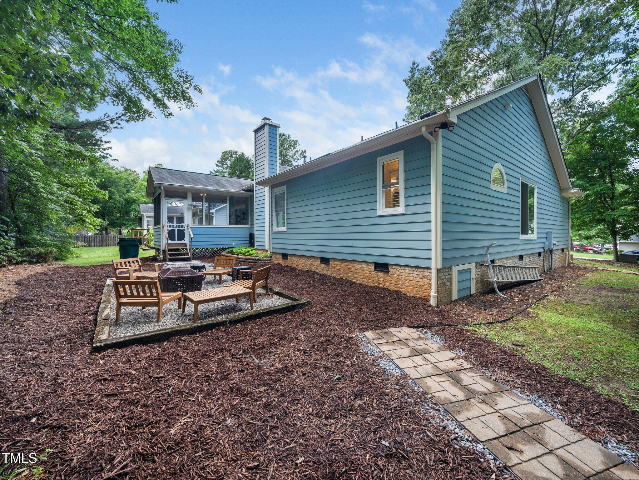 3400 Appling Way Durham, NC 27703 - Photo 27 of 30 a view of a house with backyard and sitting area