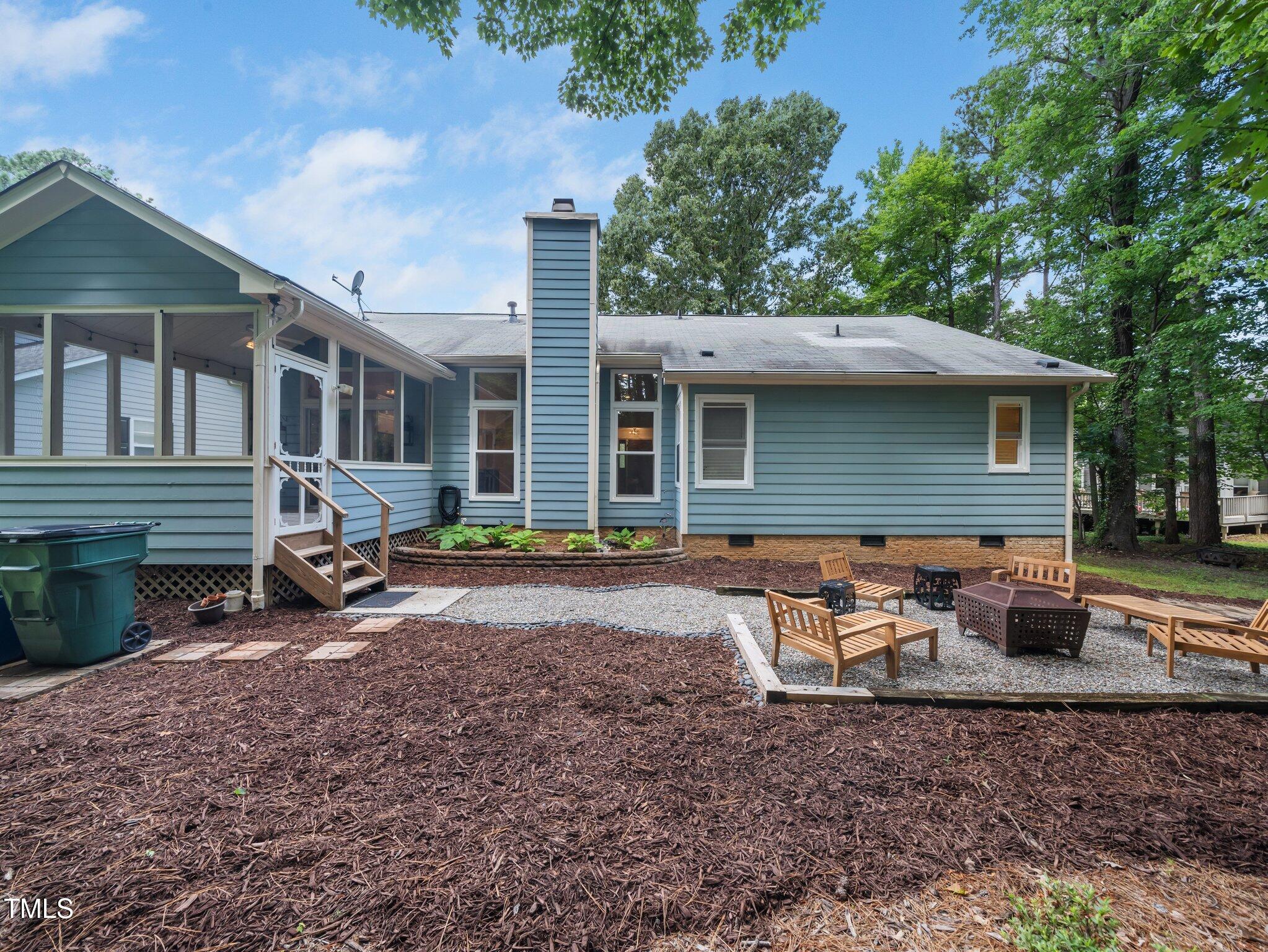 3400 Appling Way Durham, NC 27703 - Photo 30 of 30 a view of a house with backyard and chairs