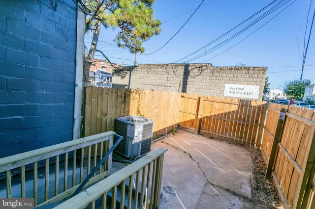 a view of porch with wooden floor