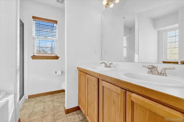 a bathroom with a bathtub and sink
