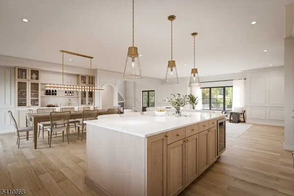 a kitchen with sink stove and cabinets