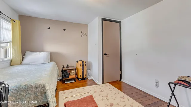 a view of staircase with white walls