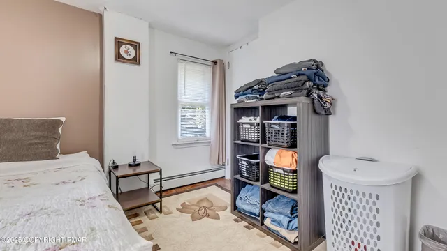 an aerial view of a house with a garden